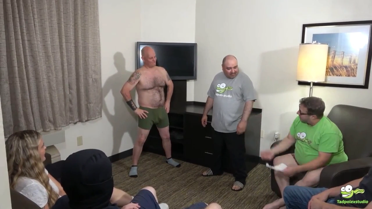 Tadople’s improv class turns into a wild porn set. A beautiful blonde BBW gets gang banged by a group of horny men, her moans and screams of pleasure echoing in the room.